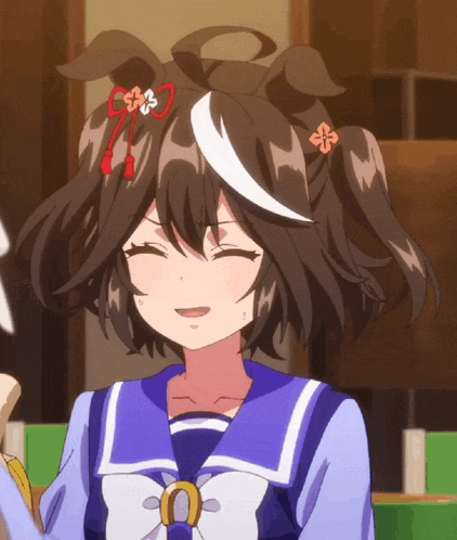 a girl with pigtails and a bow on her hair