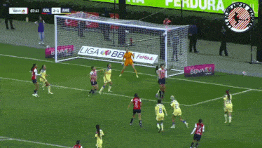 a soccer game is being played in front of a sign that says liga