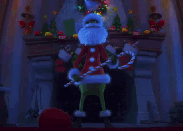 the grinch is holding a candy cane in front of a fireplace decorated for christmas