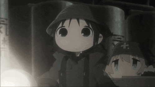 two cartoon characters one with a cross on her hat