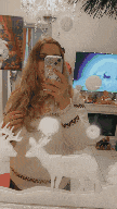 a woman is taking a selfie in a mirror