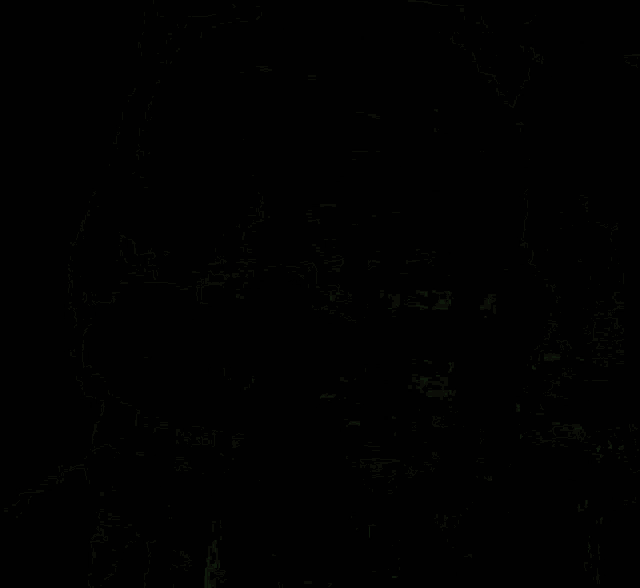 a black background with red and green spots and lines