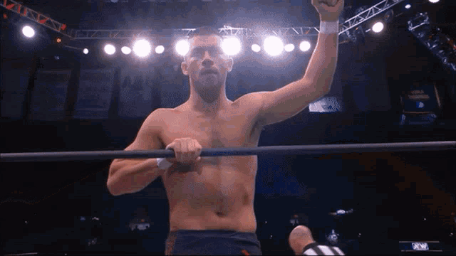 a man in a wrestling ring with the word rcmp on the bottom