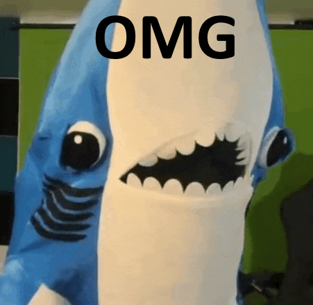 a blue and white stuffed shark with the word omg on it