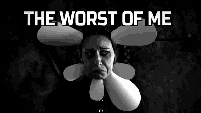 a woman with a flower on her head and the words the worst of me