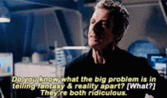 a man in a black shirt is talking about fantasy and reality