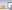 a blurred image of a room with a purple and white gradient .