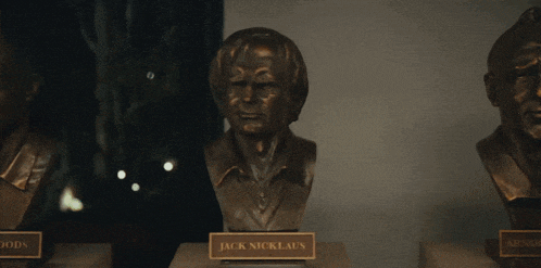 two busts of tiger woods and jack nicklaus on display
