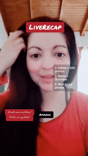 a woman in a red shirt has a liverecap on her head