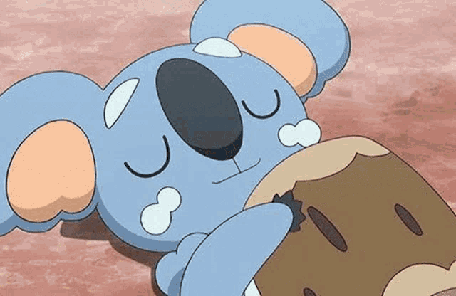 a cartoon koala bear is laying on the ground holding a log .