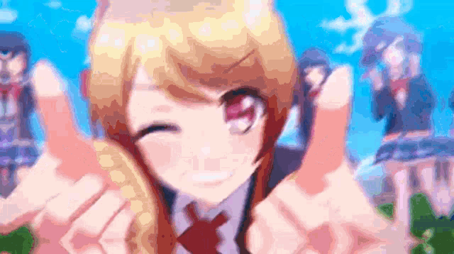 a girl with blonde hair is giving a thumbs up