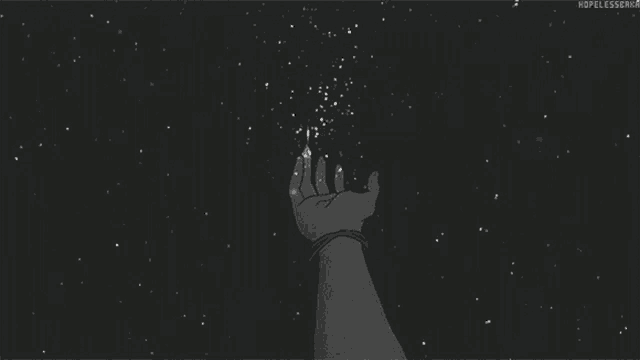 a person 's hand is reaching for a star in the night sky