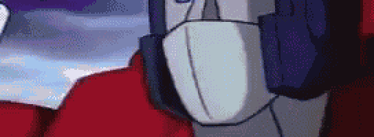 a close up of a robot wearing headphones and a helmet .