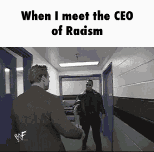 two men shaking hands in a hallway with the words " when i meet the ceo of racism " on the bottom