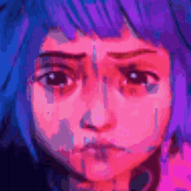a close up of a girl 's face with blue hair