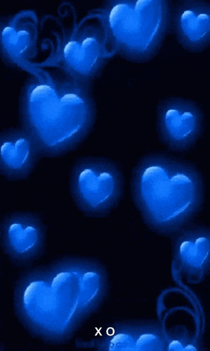 blue hearts on a black background with the letters xo