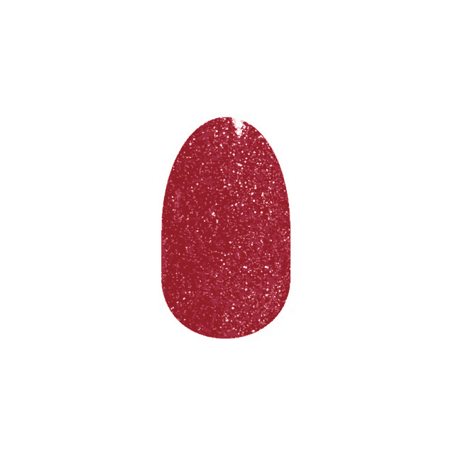 a close up of a red nail with glitter on it