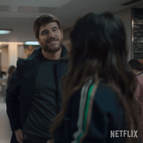 a man kissing a woman with a netflix logo on the bottom right