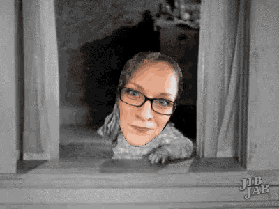 a picture of a woman with glasses looking out a window with jlb jab written on the bottom