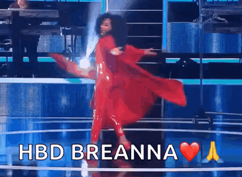 a woman in a red dress is dancing on a stage and the words hbd breanna are above her .