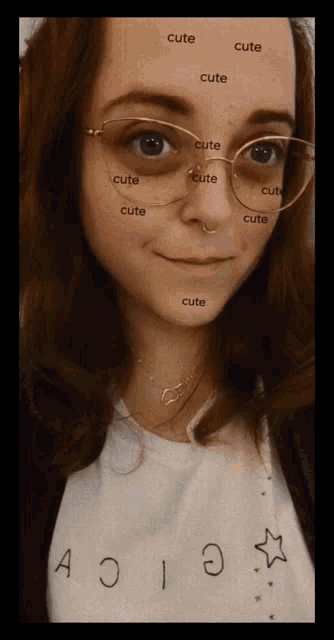 a woman wearing glasses and a shirt that says cute