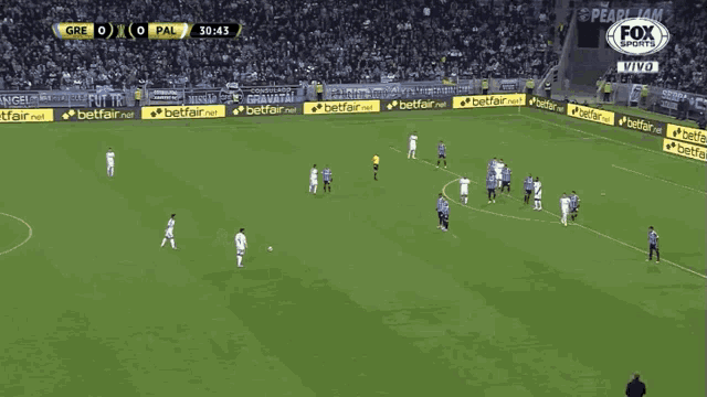 a soccer game is being broadcasted on fox sports