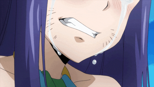 a close up of a girl with purple hair crying