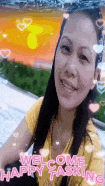 a woman in a yellow shirt is smiling with the words welcome happy tasking above her