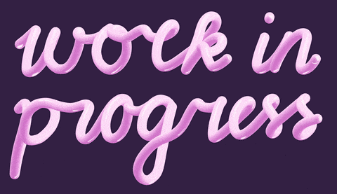 a purple background with the words work in progress