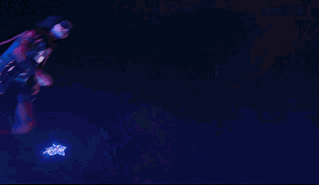 a msmarvel gif with a jellyfish in the background