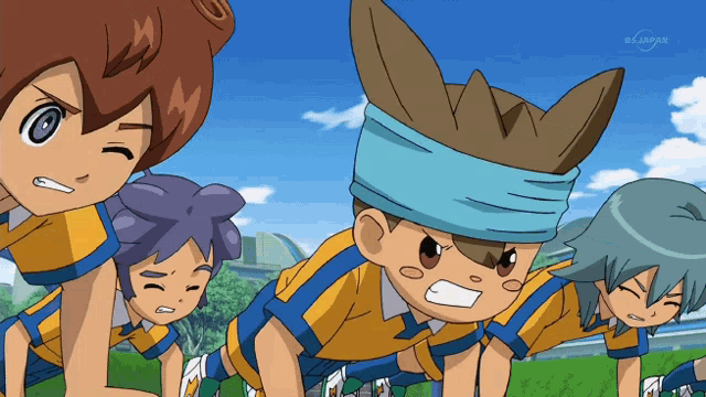 a group of cartoon characters are lined up in a row and one of them has a headband on his head