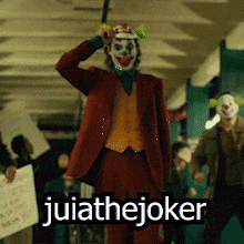 a man dressed as the joker with the words " juiathejoker " on the bottom