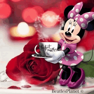 minnie mouse is holding a cup of coffee in front of a rose .