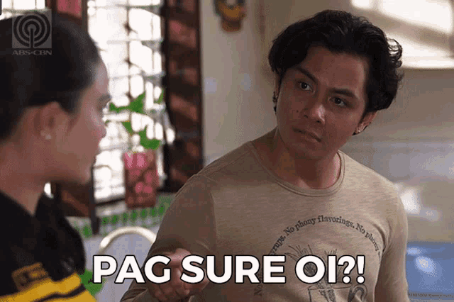 a man with a shirt that says pag sure oi on it