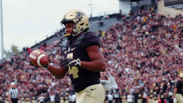 a football player with the number 4 on his uniform