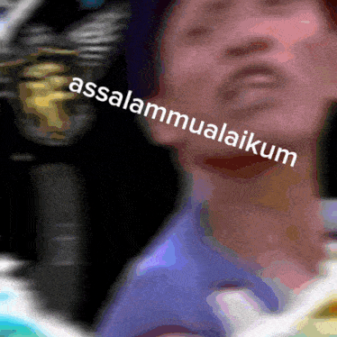 a blurry picture of a person with the words assalamualaikum written on the bottom