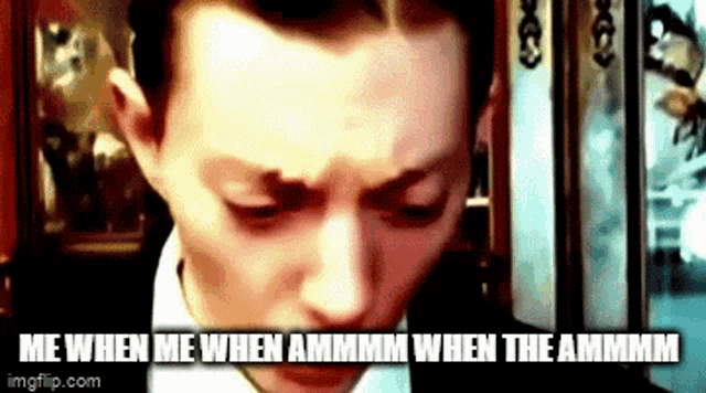 a close up of a man 's face with the words me when me when ammm when the ammm on the bottom