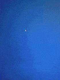 a computer generated image of a robot with glowing blue arms and legs