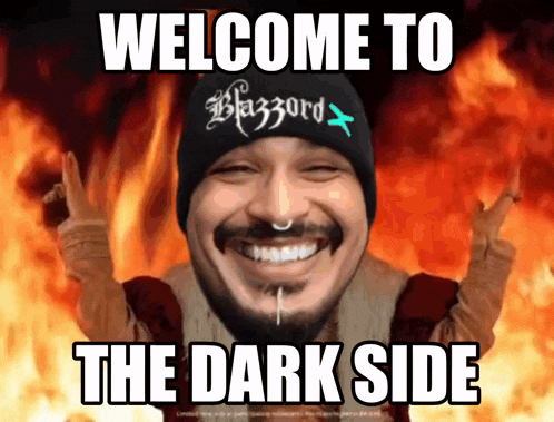 a man wearing a beanie that says blizzard on it is smiling