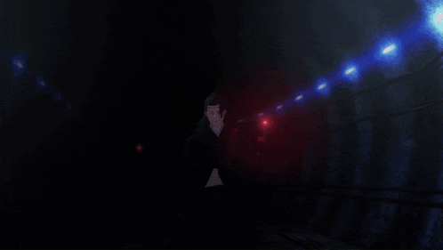 a man in a black robe is standing in a dark room with red lights behind him