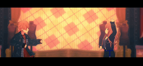 a boy and a girl are dancing in front of a checkered wall