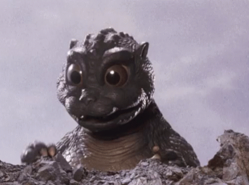 Godzilla Grab GIF - Godzilla Grab Baby GIFs