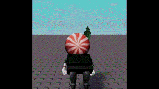 a person with a peppermint candy on their head