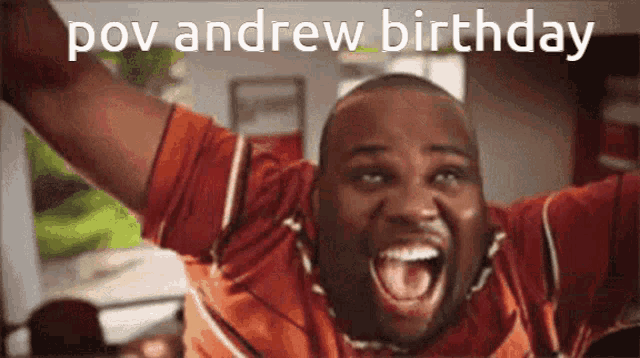 a man is celebrating his birthday with his arms in the air and his mouth open .