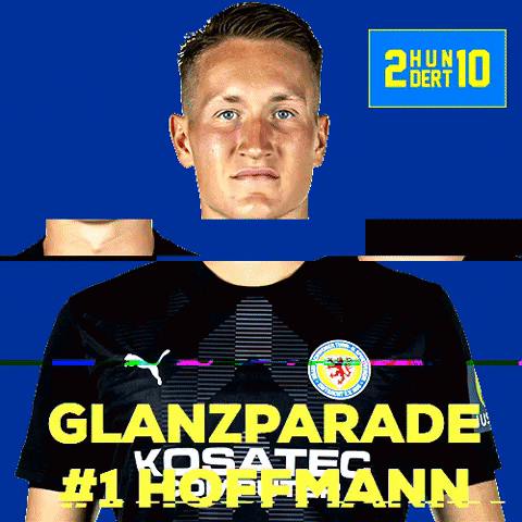 a man wearing a black shirt with the words glanzparade # 1 hoffmann on it