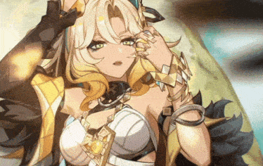 a girl with blonde hair and green eyes is wearing a gold ring