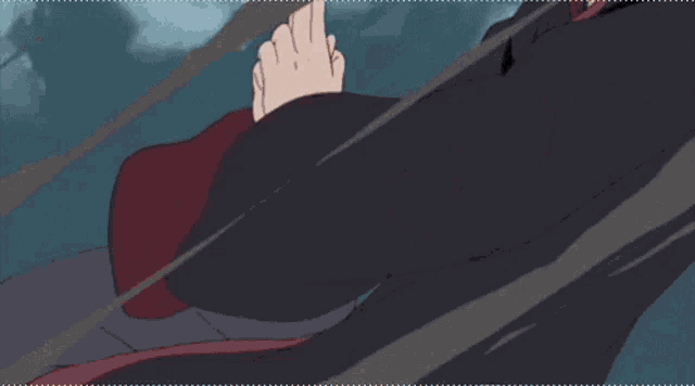 itachi uchiha from naruto is wearing a hooded cloak and holding a fireball in his mouth .