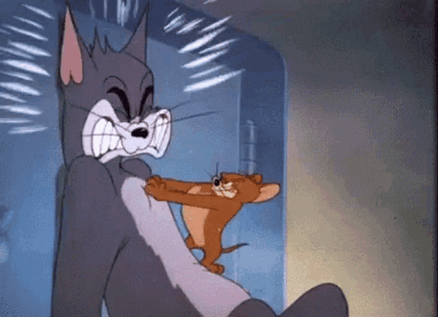 a cartoon of tom and jerry fighting each other in a room .