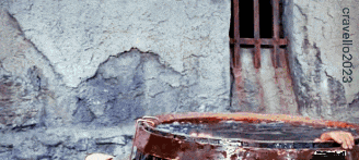 a picture of a person in a barrel with the year 2003