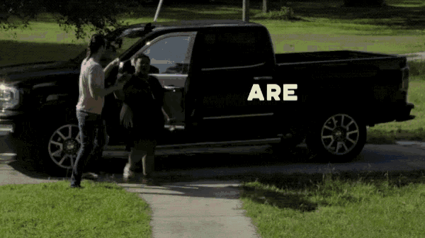 a black truck has the word are on the side